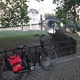 The canals and swans of Bruges on an early-morning ride before the tourist buses arrived!