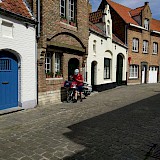 Mail carrier, typical street in Bruges (photo by Oddly)