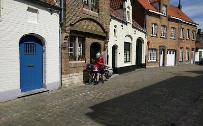 Mail carrier, typical street in Bruges (submitted by Oddly)