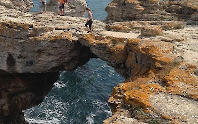 Clambering along cliffs and across a natural bridge on the Black Sea (submitted by JimJ)