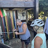 Learning how to weave fishing nets. (photo by Bob Anderson)