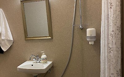 The bathroom in one of our hotels (the shower runs via the sink) - not sure how this hotel managed to eke out 3 stars ... (submitted by Sam Fleischacker)