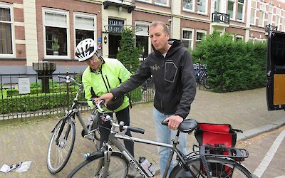 1 Peter Vos from Tulip Cycling adjusting Ann's bike. (submitted by Pedalann)