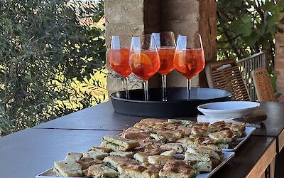 Wine and appetizers set in Tuscan charm and beauty. (submitted by Betty B.)