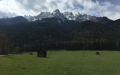 Biking through valleys with snow capped mountains in the distance (submitted by Nancyhj)
