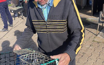 Repairing octopus traps. (submitted by Robert Anderson)