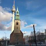 A church with the TV Tower in the background. (photo by Bozena)