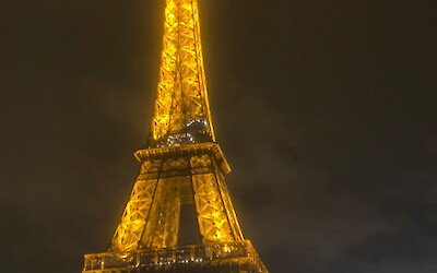 Eiffel Tower from the Seine (also biked past it during the day) (submitted by Dee Knight)