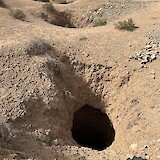 A deep pit that is an ancient remnant of the water tunnels that brought H2O from the Atlas Mountains (photo by A. Anderson)