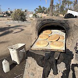Bread baking outside the village! (photo by Pam)