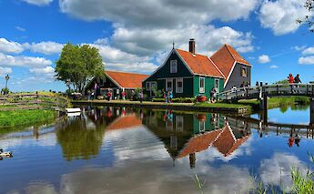 Reflections in the water in Zaanse Schans, Holland. Unsplash@Aswathy N