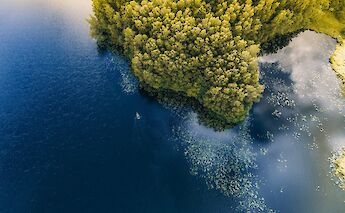 Rowing boat in Plunge, Lithuania. Unsplash@Humphrey M
