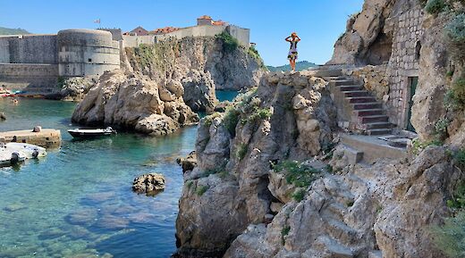 Standing on the rocks in Dubrovnik, Croatia. Unsplash@Datingjungle