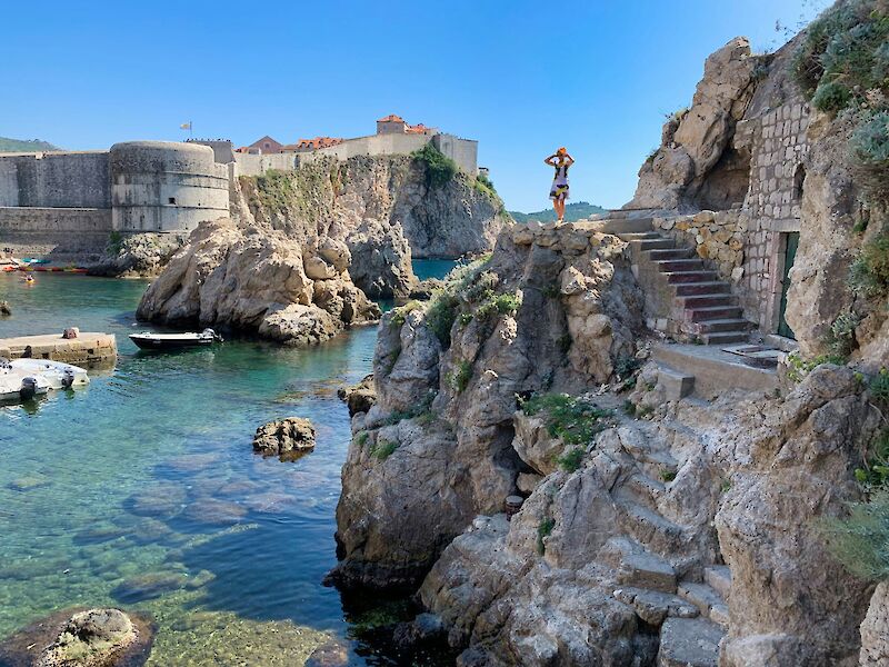 Standing on the rocks in Dubrovnik, Croatia. Unsplash@Datingjungle