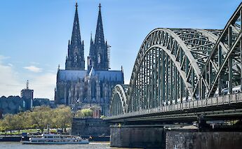 Spires of Cologne Cathedral viewed from the Rhine River, Germany. Unsplash@Ravi Tripathi