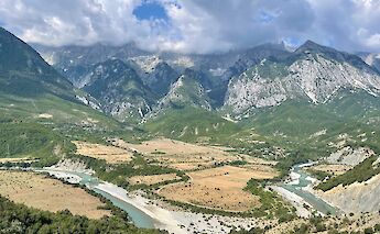 Vjosë River & the Trebeshinë-Dhëmbel-Nemërçkë Mountain range in Albania. Albina Shehetila@Unsplash