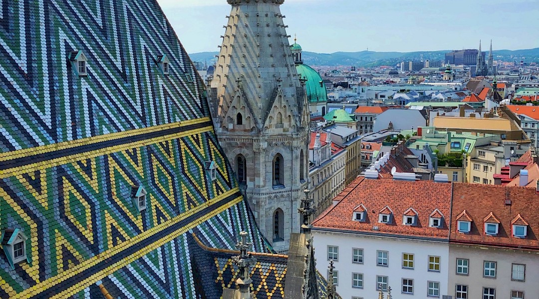 The famous tiled roof of Stephansdom in Vienna, Austria. Victor Malyushev@Unsplash