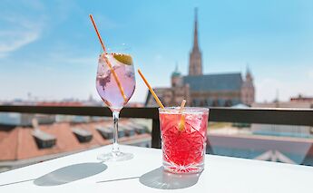 Cocktails at a rooftop bar, Vienna, Austria. Unsplash:Getty Images