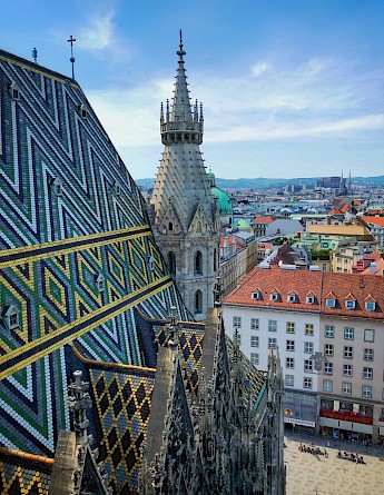 The famous tiled roof of Stephansdom in Vienna, Austria. Victor Malyushev@Unsplash