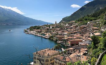 Buildings on the edge of Lake Garda, Italy. Unsplash:Marco Ghirello