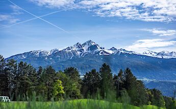 Clouds above the mountains in Innsbruck, Austria. Unsplash:Alin Andersen
