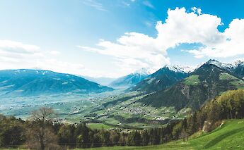 Clouds above the mountains, Merano, Italy. Unsplash:Markus Spiske