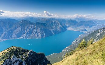 Clouds over the mountains, Lake Garda, Italy. Unsplash:Jonny Gios