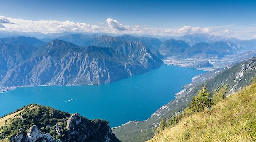 Clouds over the mountains, Lake Garda, Italy. Unsplash:Jonny Gios