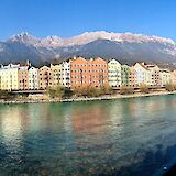 Row of buildings in front of a row of mountains, Innsbruck. Austria. Unsplash:Sarah Donisi