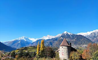 Turreted building in Merano, Italy. Unsplash:Andrea Pasquali