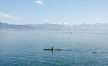 Kayaker on Lake Constance, Lindau, Germany. Unsplash:David Hertle