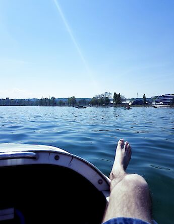 Sitting in a boat on Lake Constance, Austria. Unsplash:Alex Muzenhardt