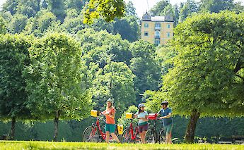 Pushing bicycles through Hellbrunn Garten, Austria. CC:TO