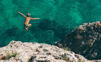 Swimming on Hvar Island, Croatia. Nikola Radoicic@Unsplash