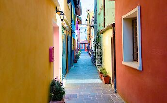 Colorful buildings in Caorle, Italy. MatthiasSchroder@unsplash