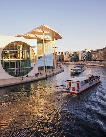 Boat on the river at sunset, Berlin, Germany. Unsplash:Julia Solonina