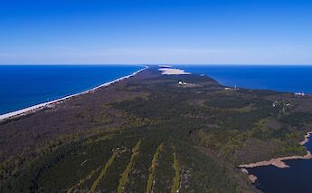 Curonian Spit separates the Curonian Lagoon from the Baltic Sea. CC:Asavin