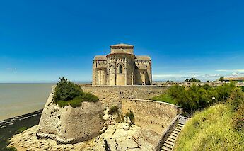 Castle by the sea, Talmont-sur-Gironde, France. Unsplash:Tristan Mimet