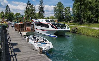 Boats on the river in Chanaz, France. Unsplash:Free Nomad