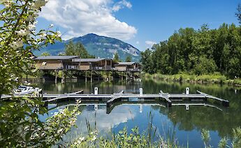 Cabins on a lake along the Via Rhona, Chanaz, France. Unsplash:Free Nomad