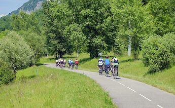 Group of cyclists on the Via Rhona. Unsplash:Free Nomad