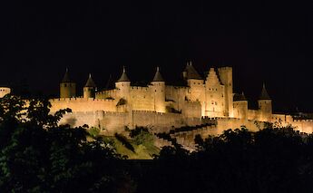 Carcassonne at night, France. Unsplash:Hugo Margolles