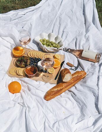 French picnic with wine. Unsplash:Calvin Shelwell