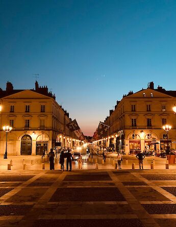 Streets of Orleans illuminated at night, France. Unsplash:Steven Sossouhounto