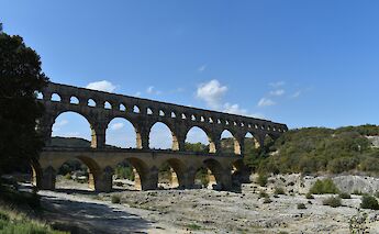 Blue skies over the Pont du Gard, Nimes, France. Unsplash:Dario Bronnimann