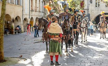 Parade in Uzes, France. Unsplash:Sue Winston