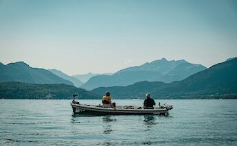 Fishermen on Lake Annecy, France. Unsplash:Guillaume Coupy