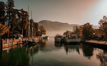 Lake Annecy at dusk, France. Unsplash:Kyle Evans