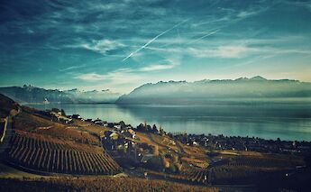 Lake Geneva at dusk, Switzerland. Unsplash:Til Jentzsch
