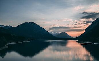 Sylvenstein Lake at dusk, Bavaria, Germany. Unsplash@Gabriel Sollmann